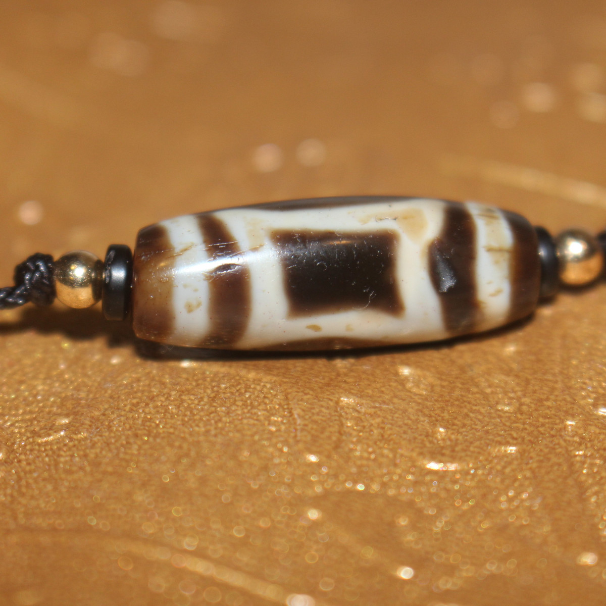 The Myth and Mystery of Tibetan Dzi Stone Beads - Owlcation